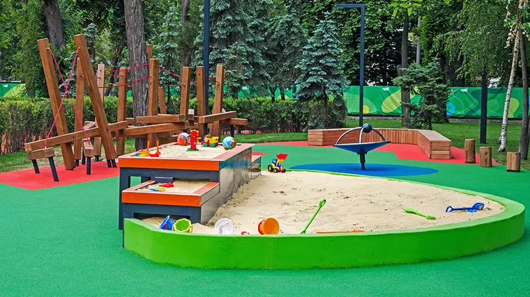 Picture of sandbox and play area. 