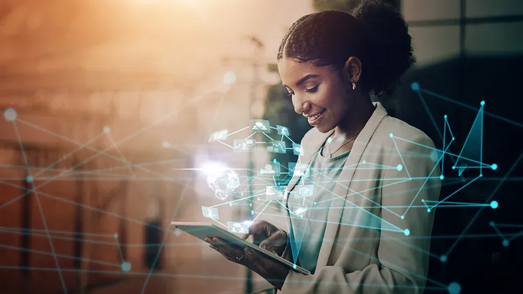 Picture of girl holding iPad with geometric shapes circling around her. 